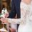 couple-with-decorated-wine-glasses-their-wedding-day
